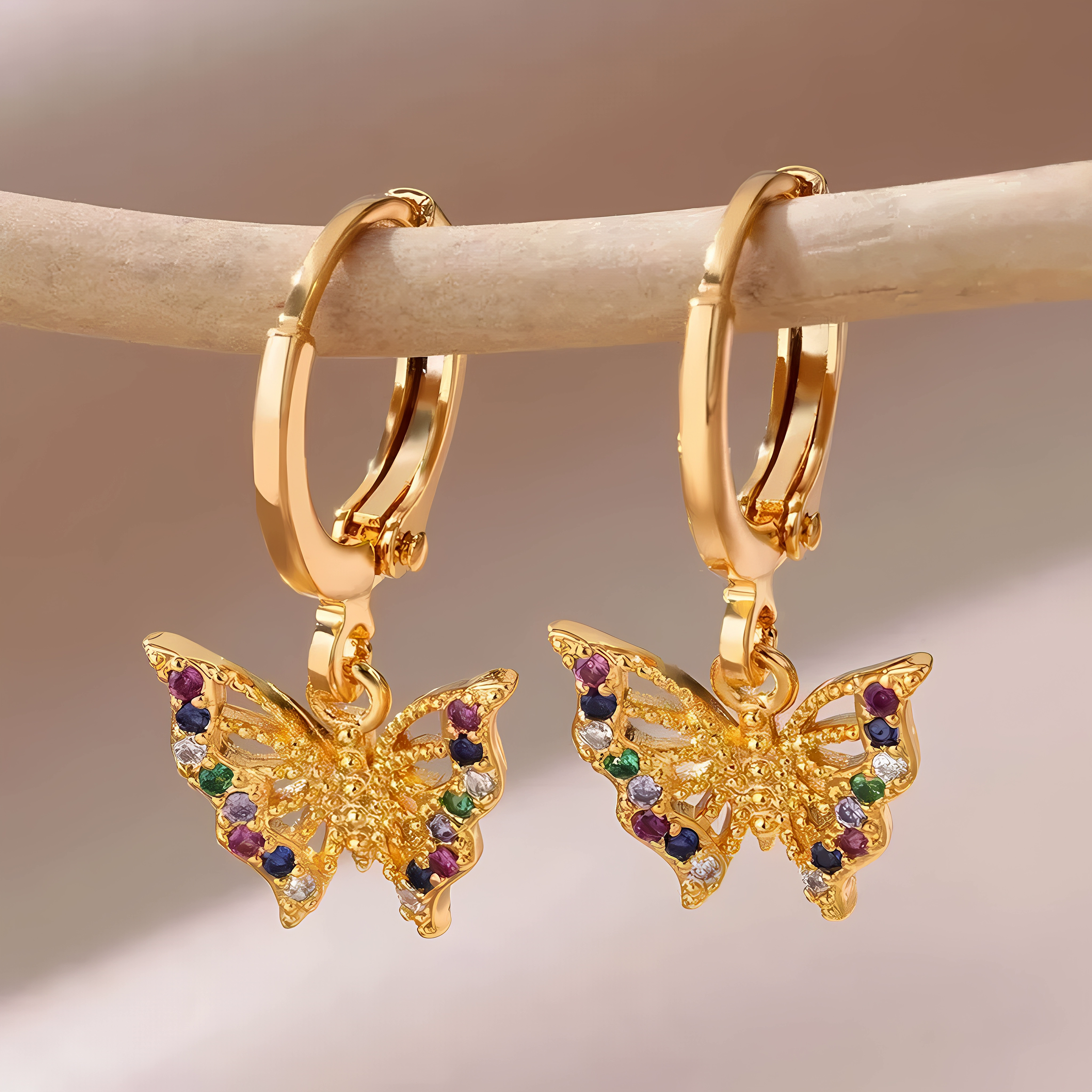 Maeve cross and butterfly huggie earrings, gold plated